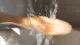 Cleaning a dildo after anal use with warm water