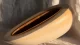 Dual-density dildo showing possible separation between its soft outer layer and firm core