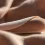 Realistic uncut dildo with a movable foreskin rolled beneath the head